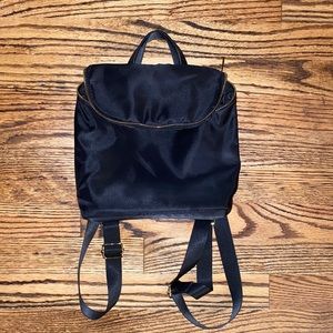 Modern soft mid-sized backpack- a new day